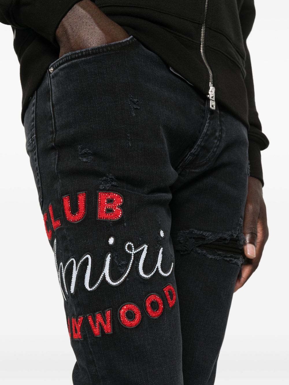embroidered distressed jeans
