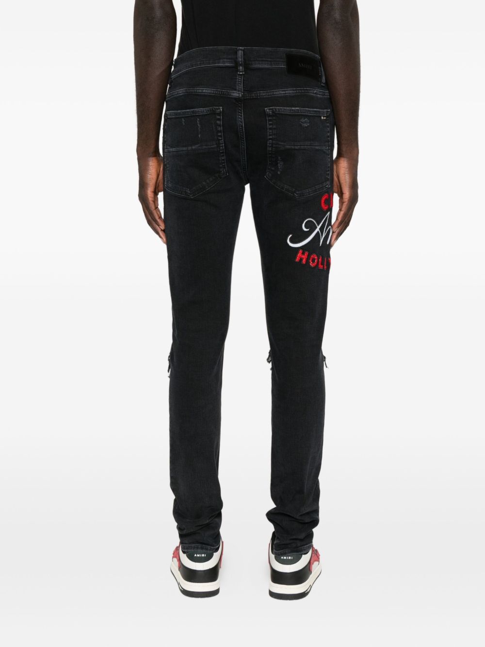 embroidered distressed jeans