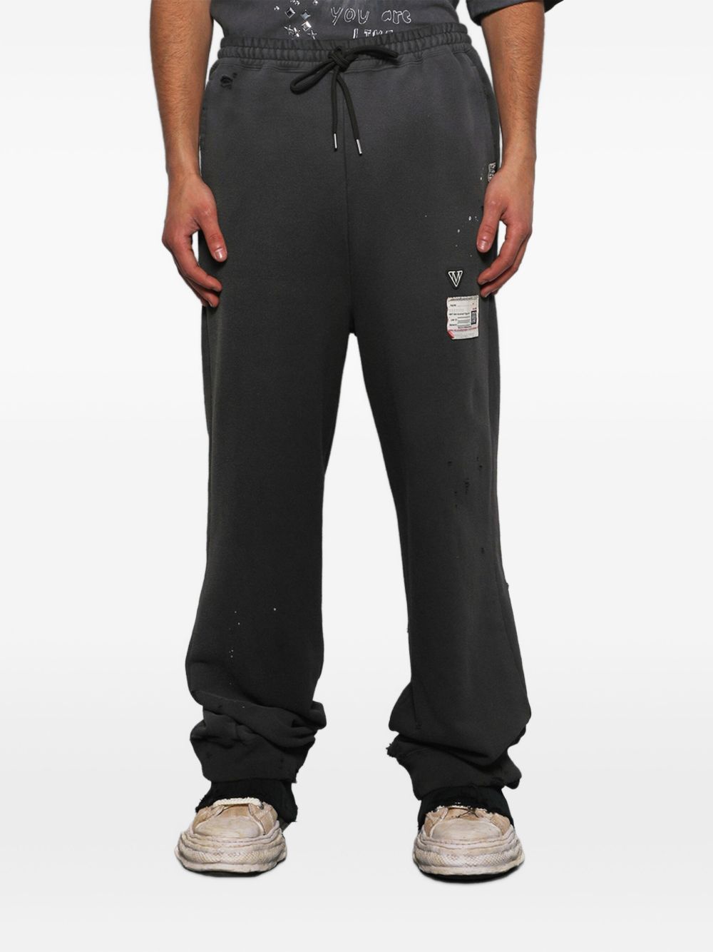 distressed track pants