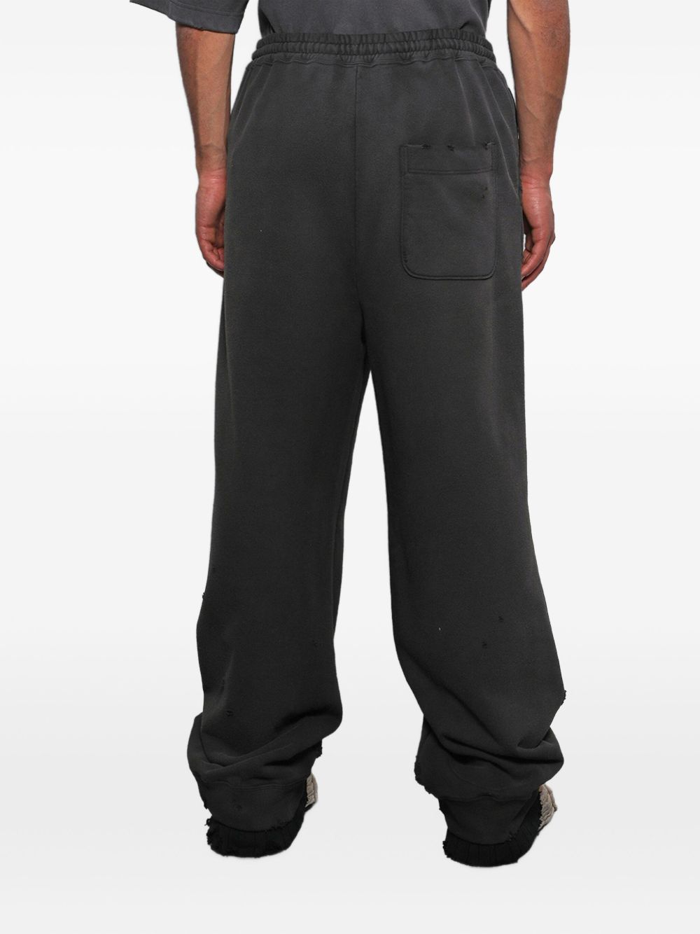 distressed track pants