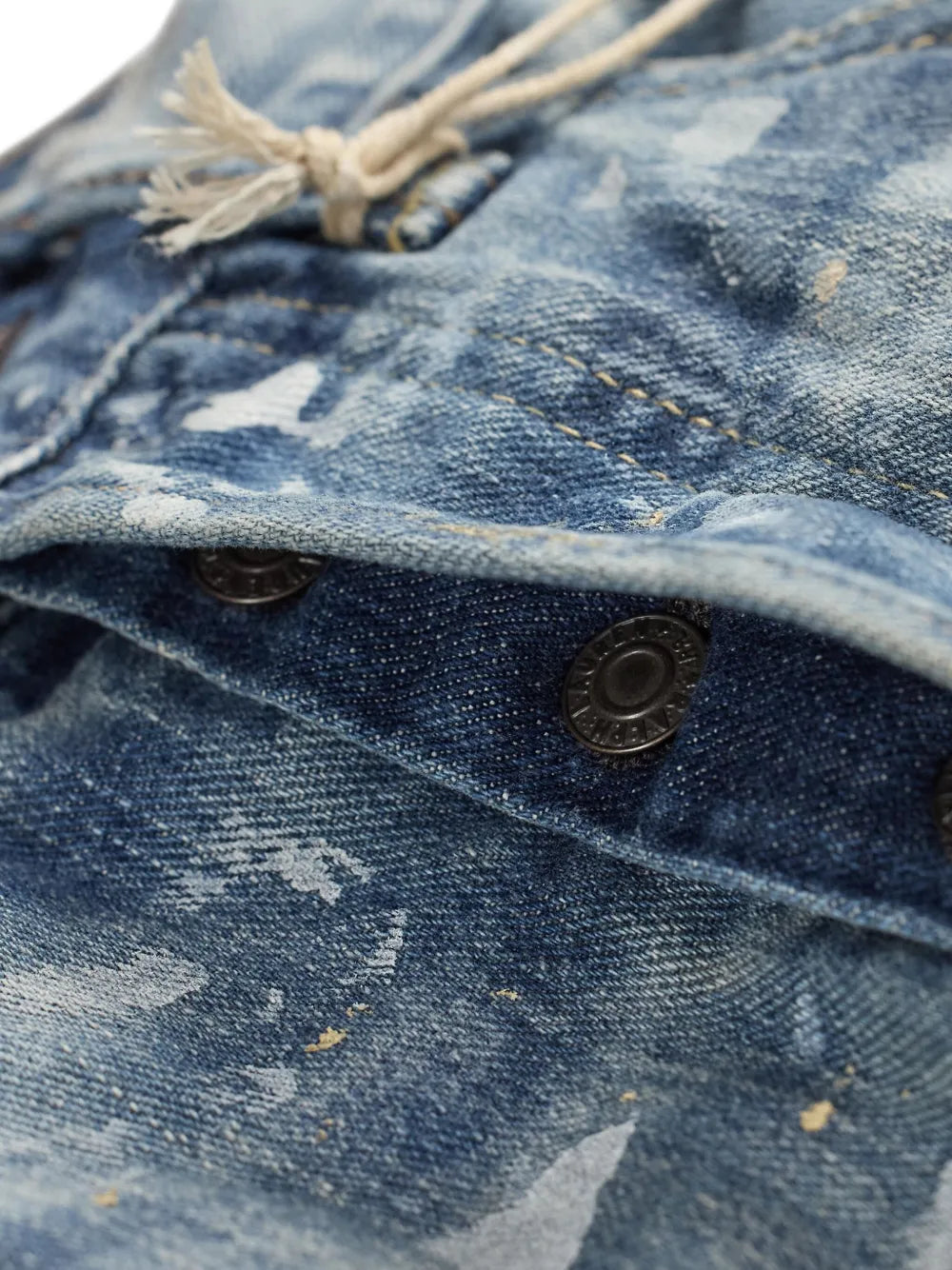 paint-splattered jeans
