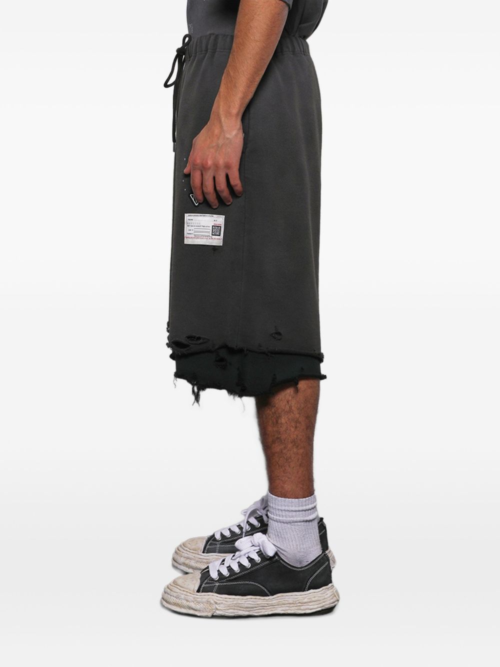 layered distressed shorts