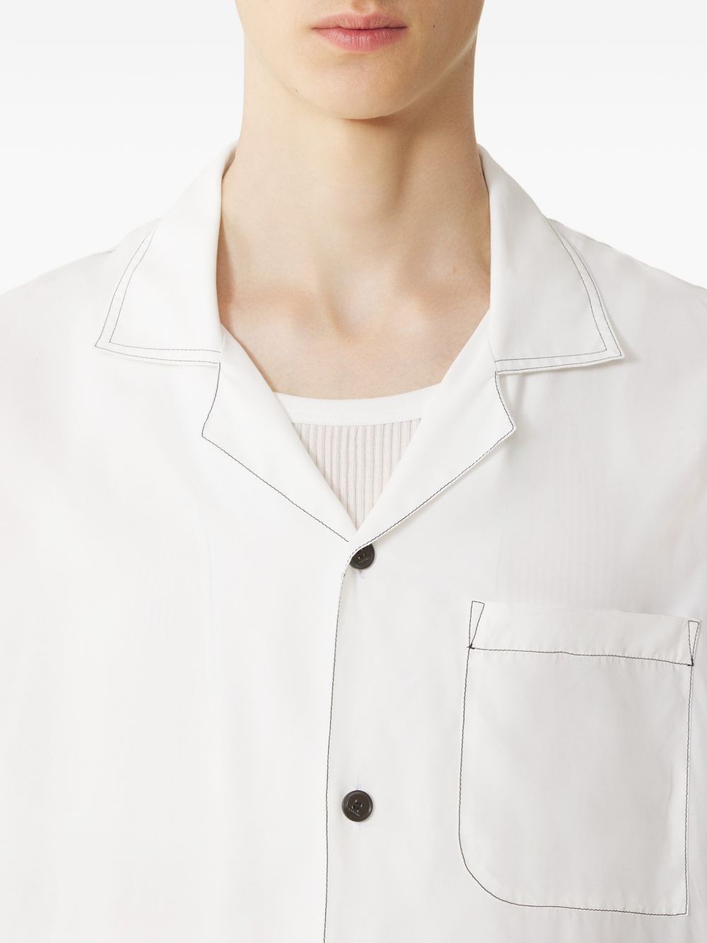 chest-pocket back-graphic shirt