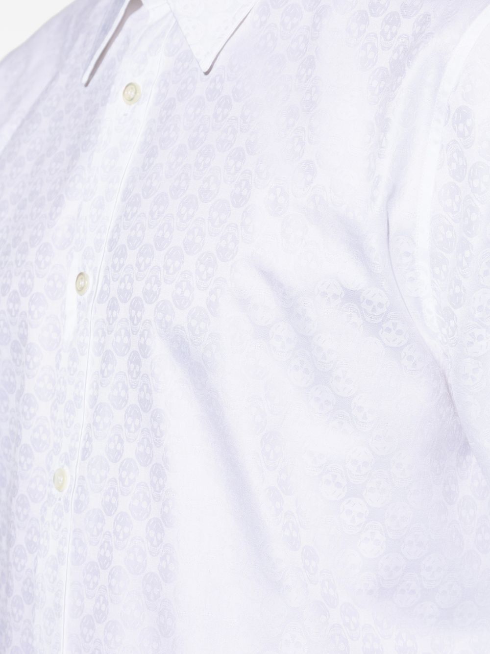 skull-print shirt