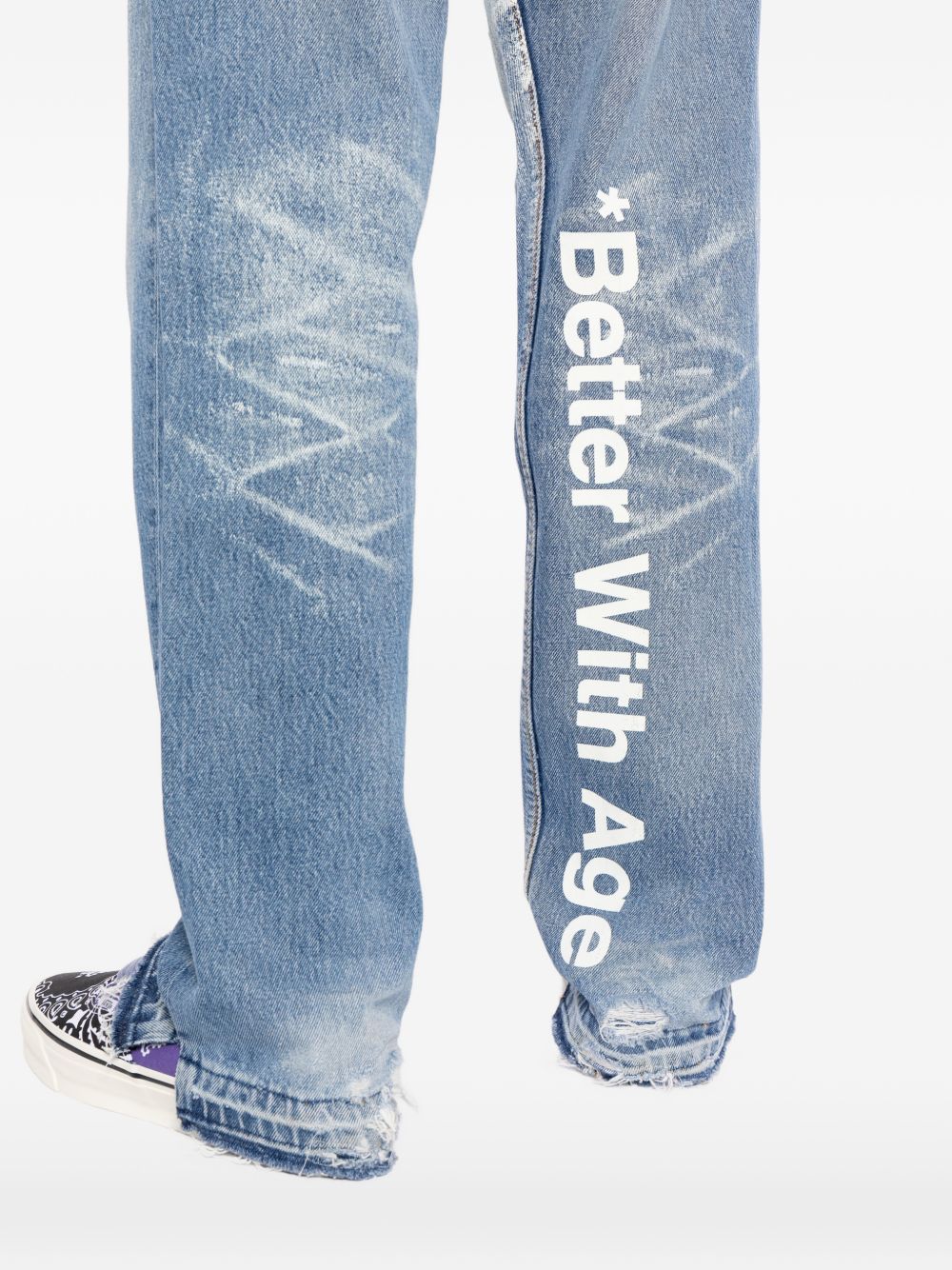 distressed faded jeans