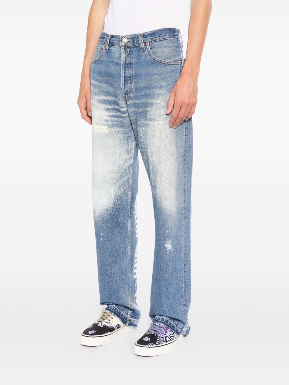 distressed faded jeans